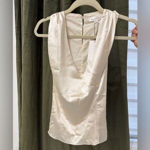 Line & Dot Cream Sleeveless V-Neck Wrap style Blouse